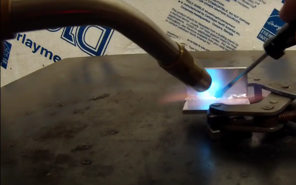 Will the brazing rod stick to aluminum? How?